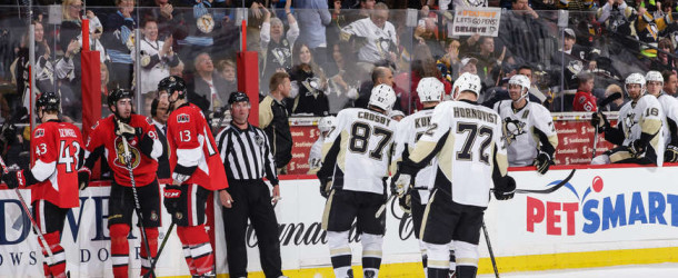Penguins let late lead slip away, lose Stadium Series game to